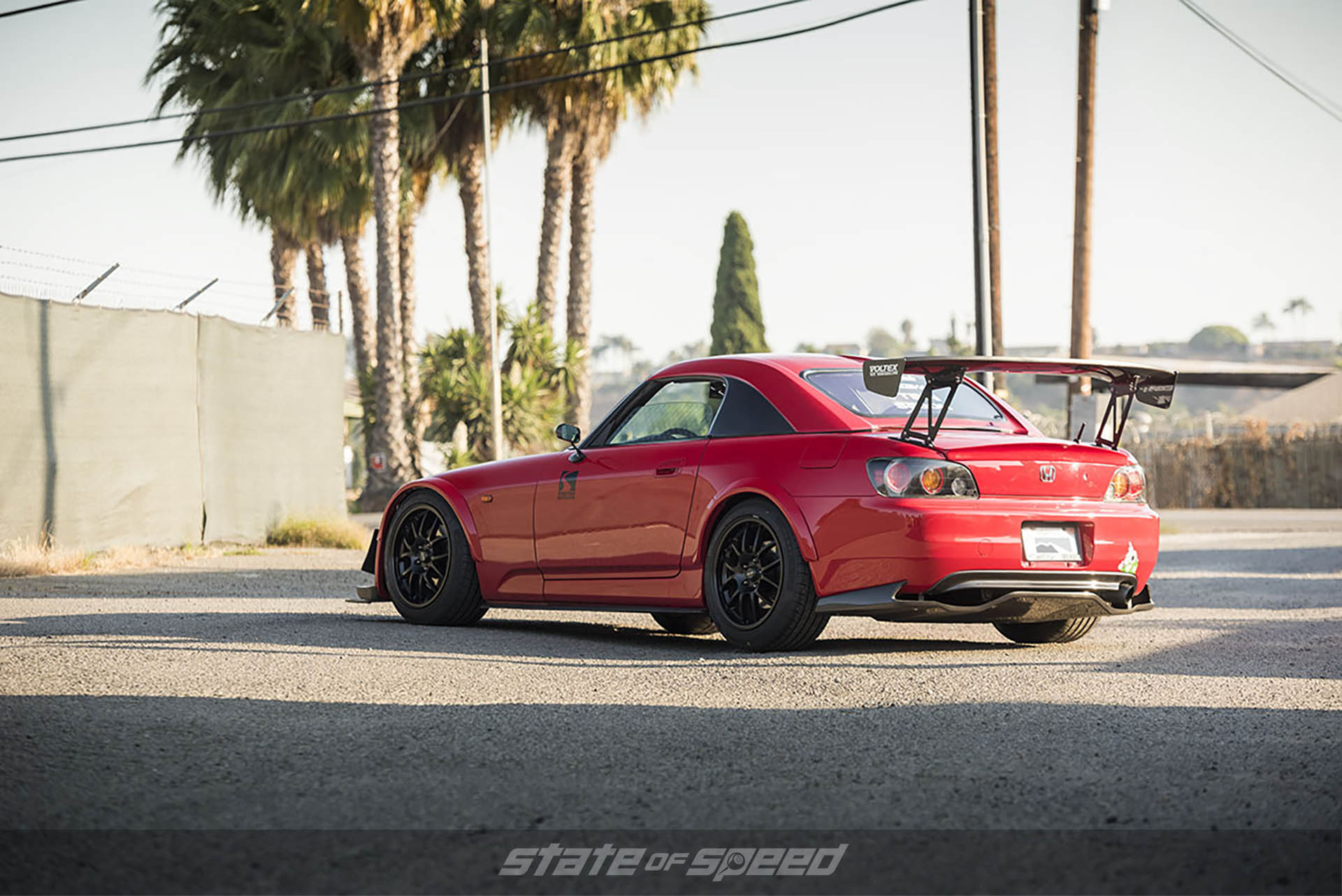 Rear shot of Tiffany Miller, aka daaamngiina, and her 2006 Honda S2000