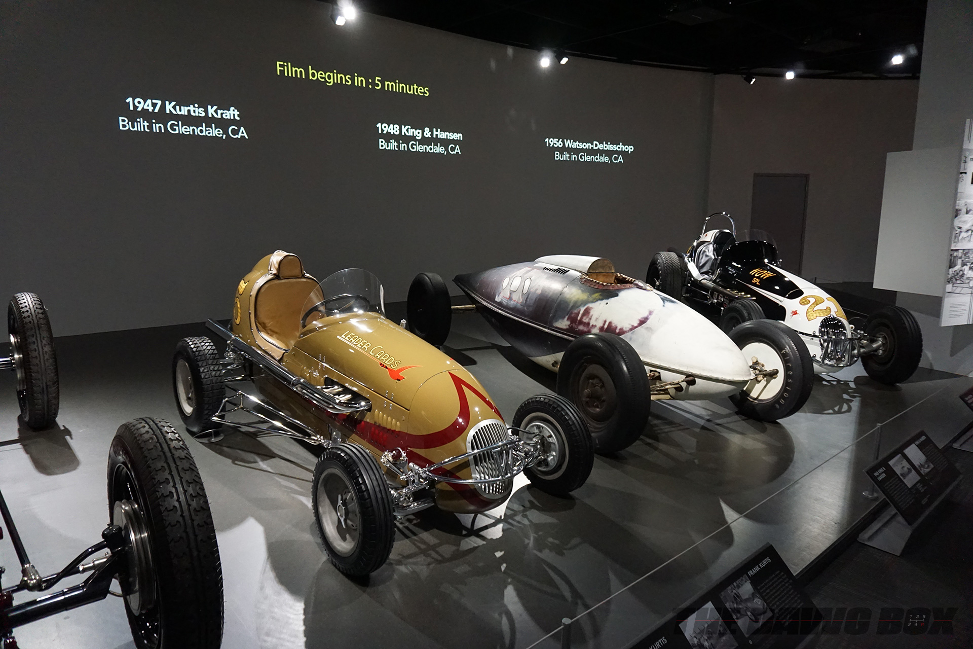 red 1924 Miller 122, Yellow 1947 Kurtis Kraft, White 1948 King and Hansen, and black 1956 Watson-Debisschop on display