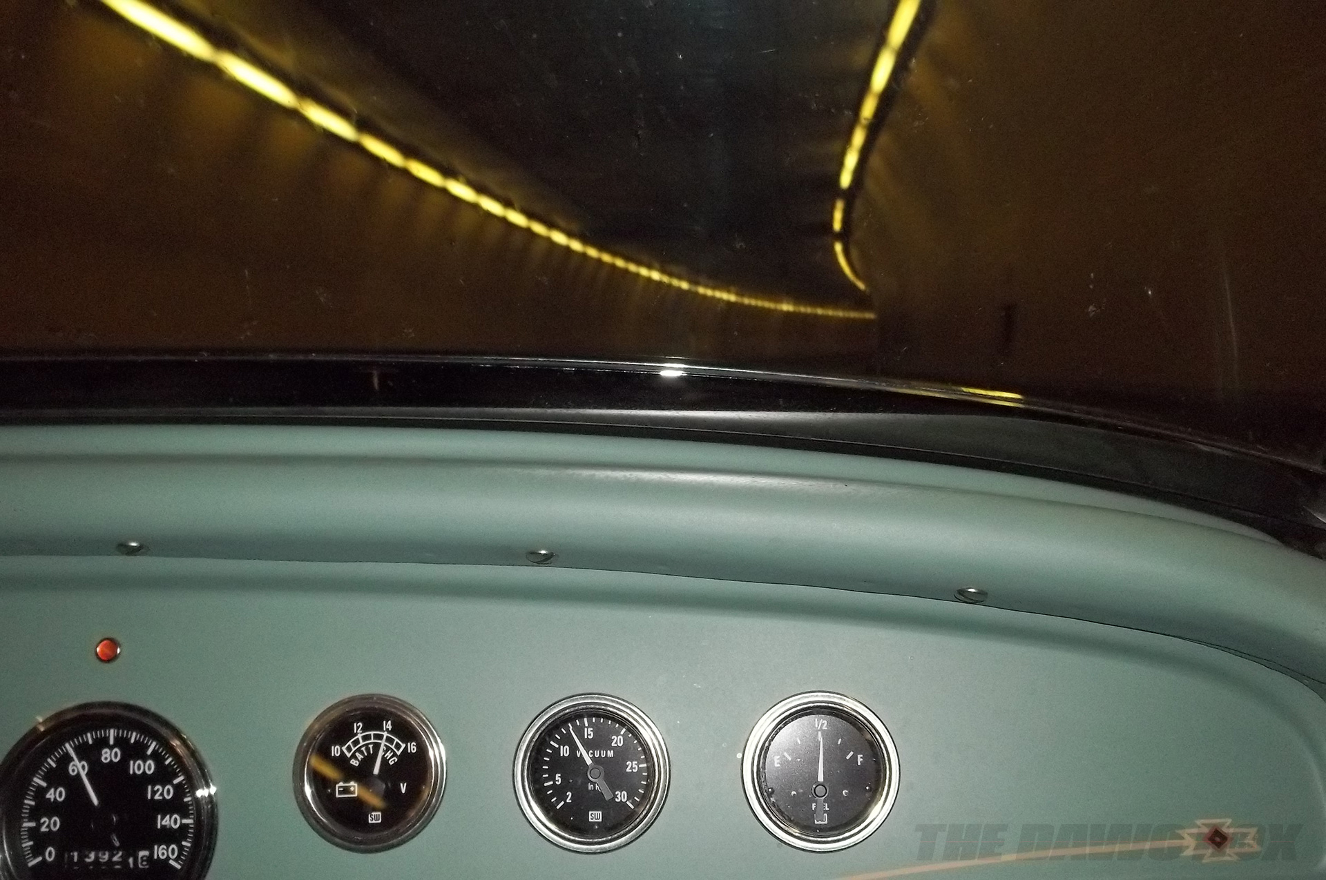 Henry Astor’s ’32 Ford Roadster being driven through a tunnel
