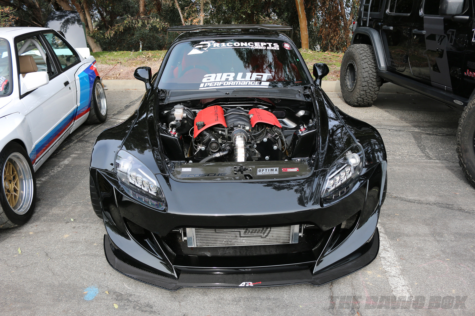 Black Honda S200 with a Corvette V8 engine swap at the Purist Group Winter Drive 2018