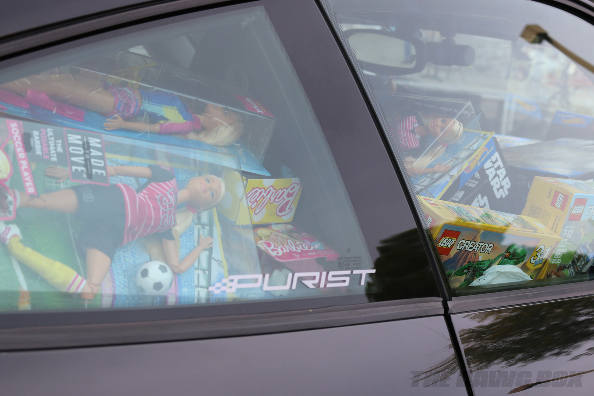 car full of toys for little kids at the Purist Group Winter Drive 2018