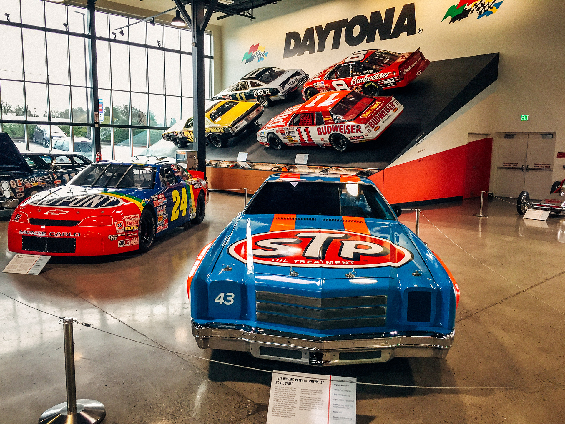 1979 Richard Petty #43 Chevrolet Monte Carlo with a life size replica of the 31-degree Daytona banking complete with four real NASCARs behind it at the World of Speed Museum