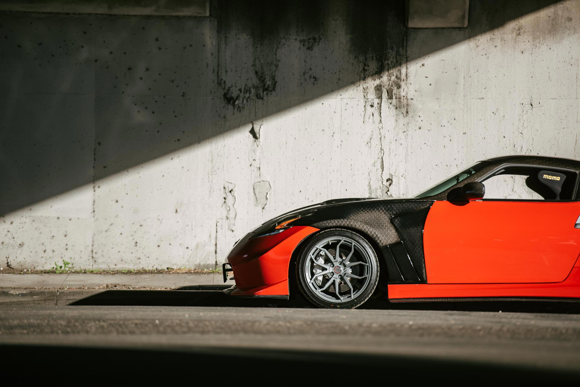 Nissan 370Z with carbon fender flares and Milestar UHP tires