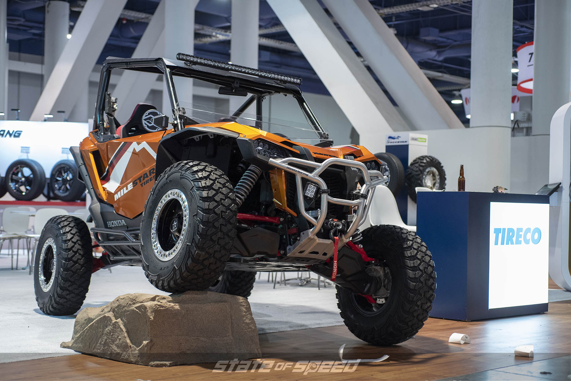 Milestar booth showing off the new SXT tire on a UTV at SEMA 2019