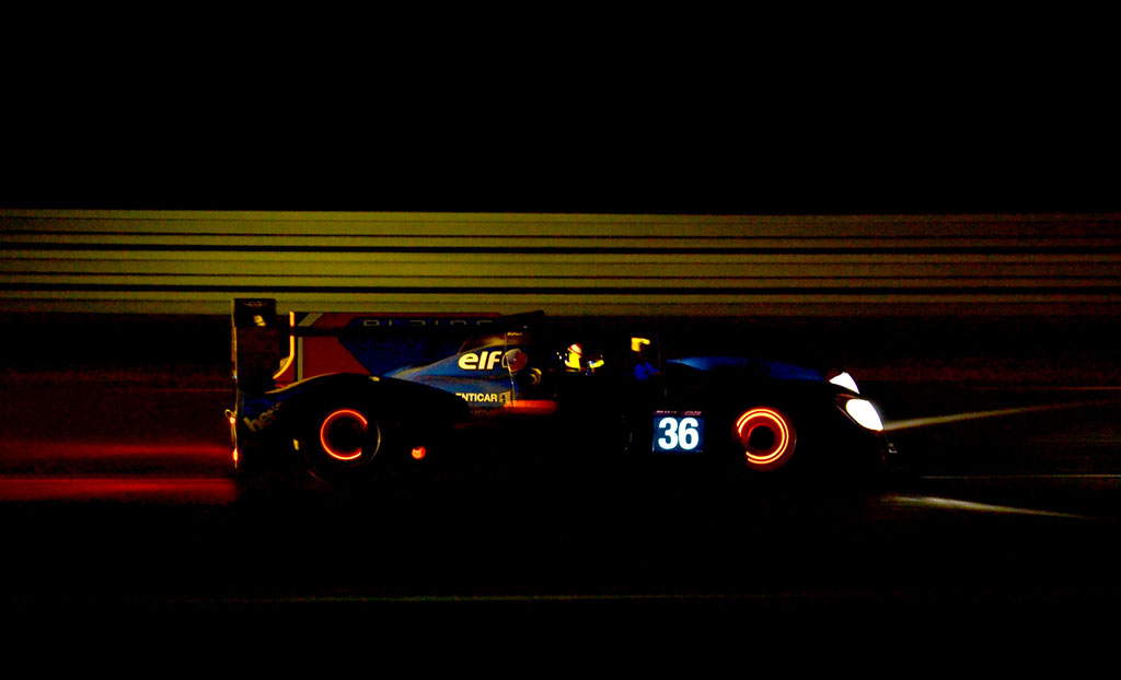 Race car with glowing rotors
