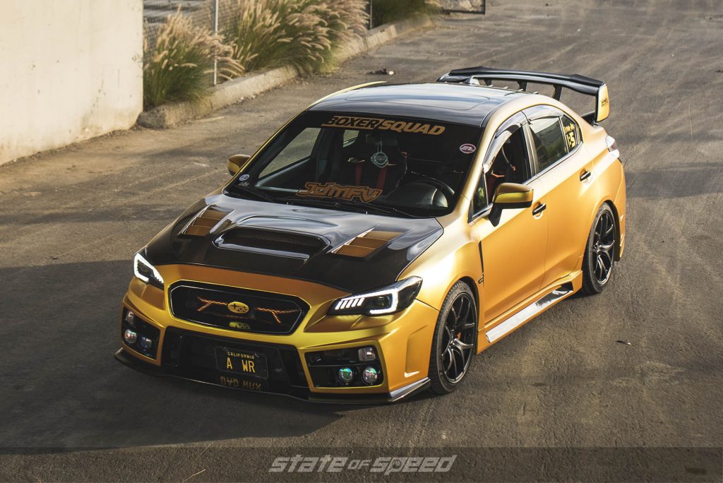 Yellow WRX with carbon fiber hood