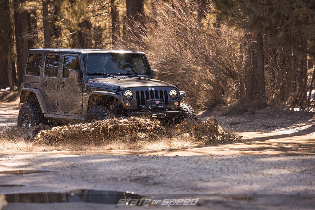 jeep jk in the mud on milestar tires