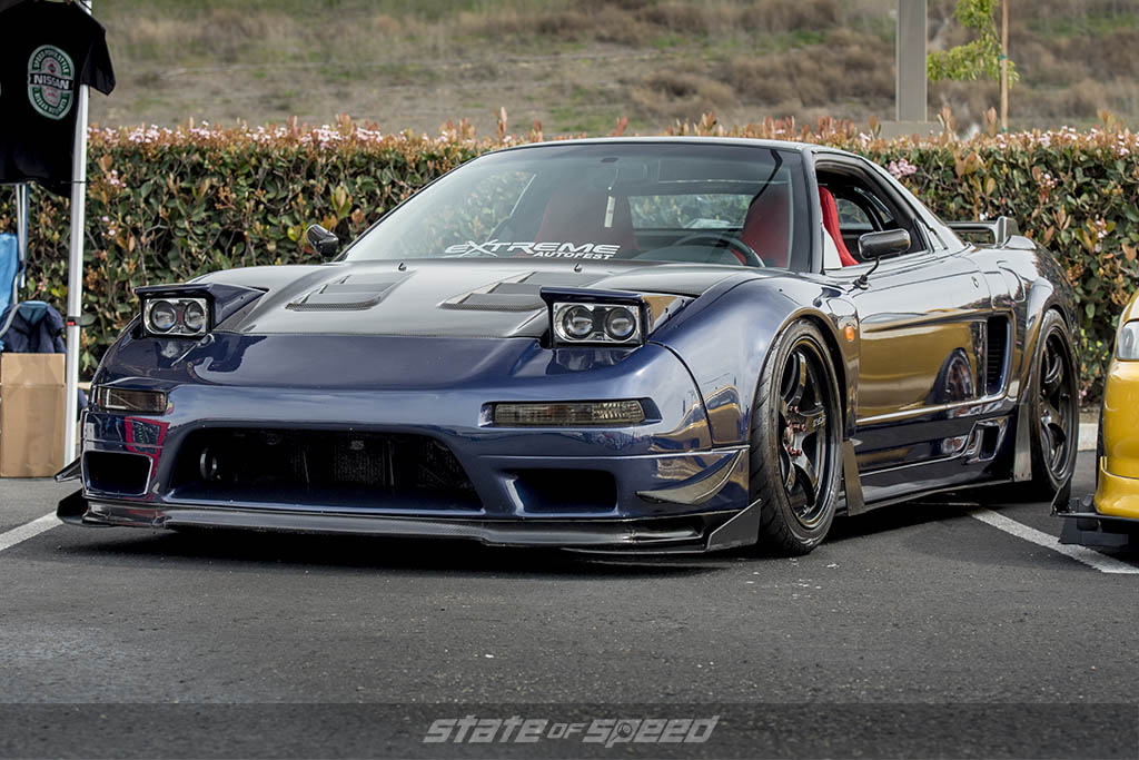 front shot of blue acura nsx that has been modified