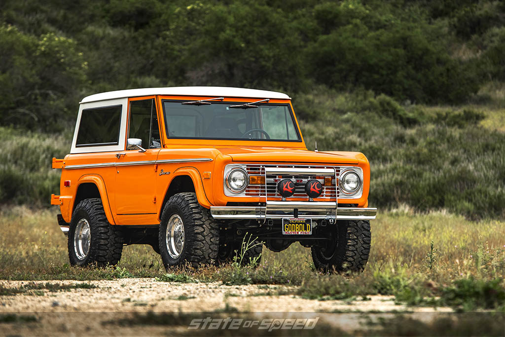 front 3/4 shot of '75 orange ford bronco on patagonia mt tires