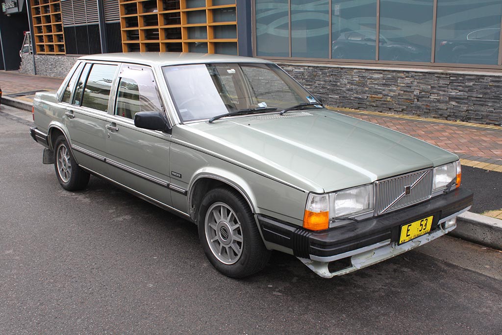 Grey 1984 Volvo 760 GLE Sedan parked on a curb