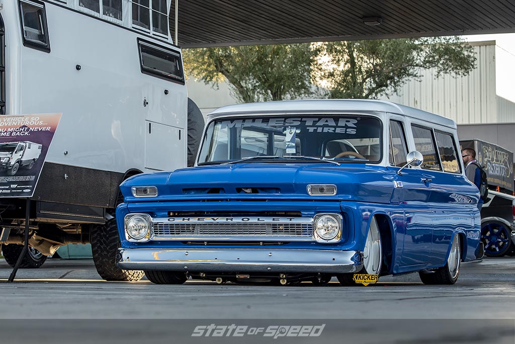 Blue and white Chevrolet C-10 Restomod with custom bed cap