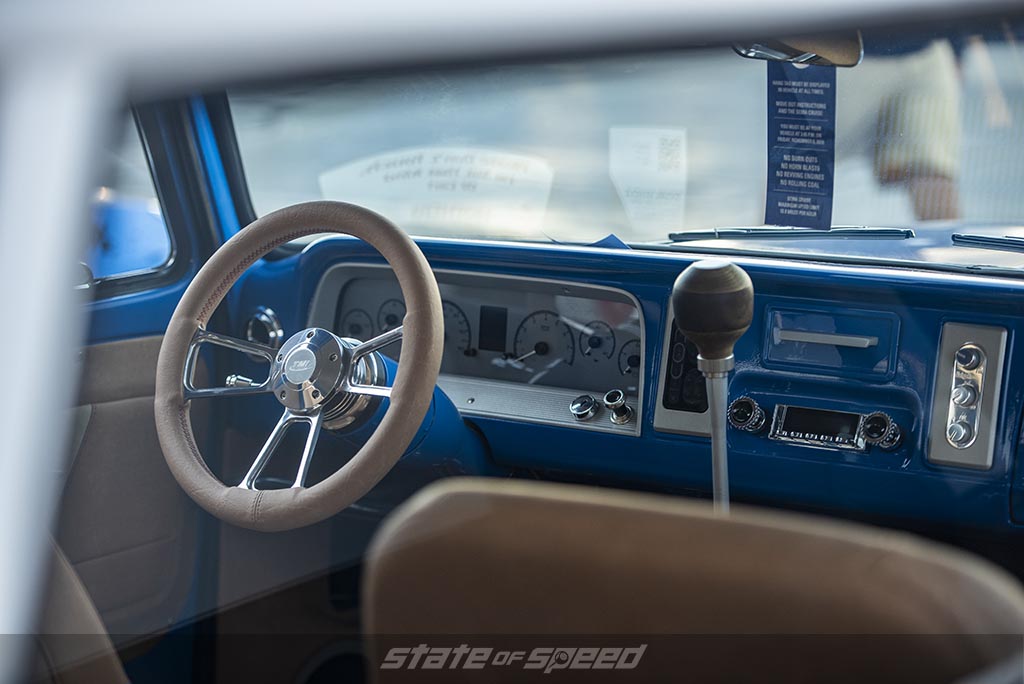 interior shot of a Blue and white Chevrolet C-10 Restomod with custom bed cap