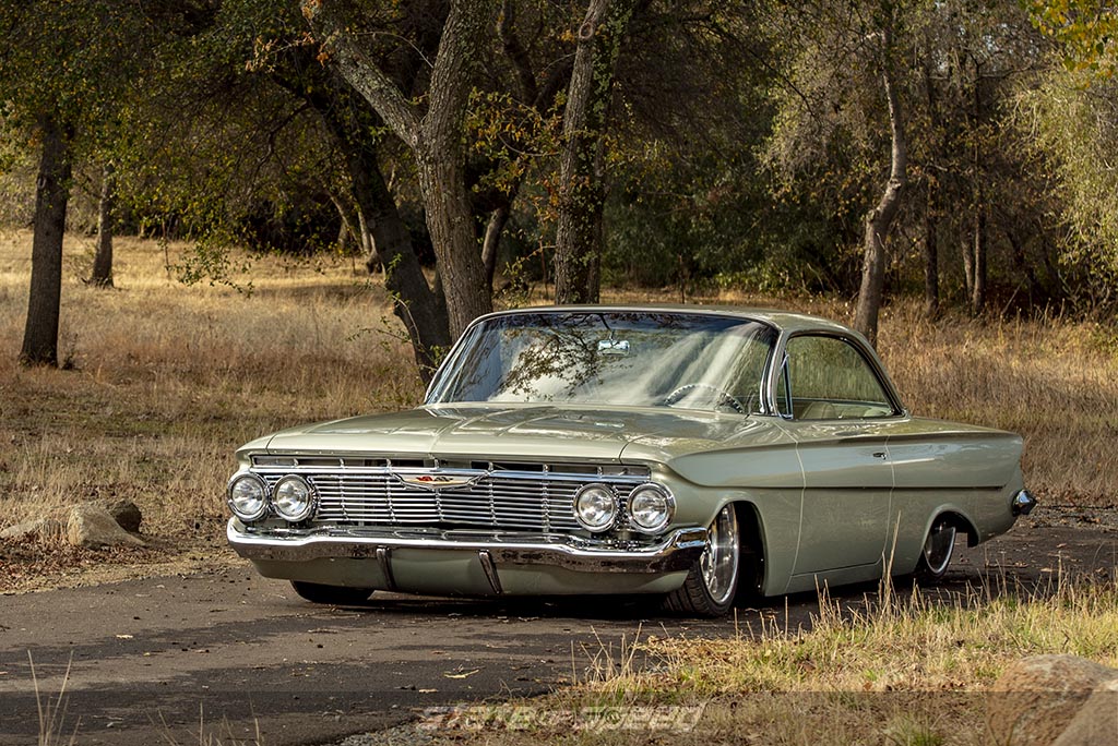 Chevy LS Engine inside a green restomod 1961 chevy impala bubbletop