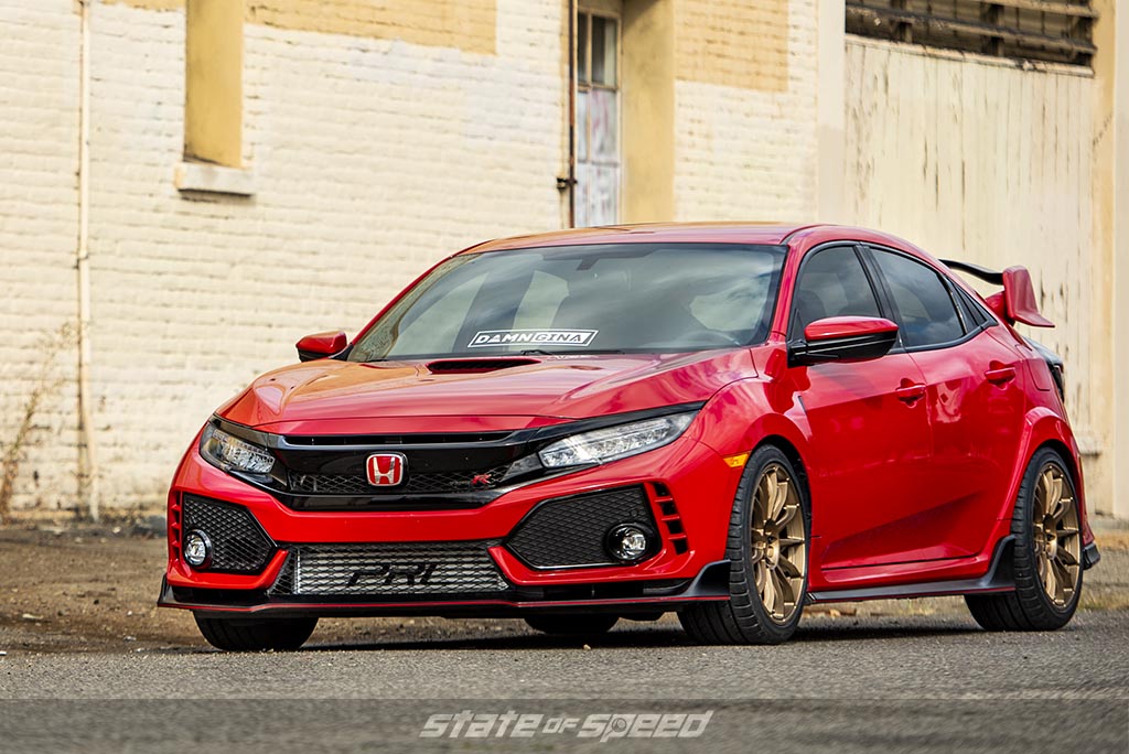 Red honda civic type-r on gold motegi wheels and milestar tires
